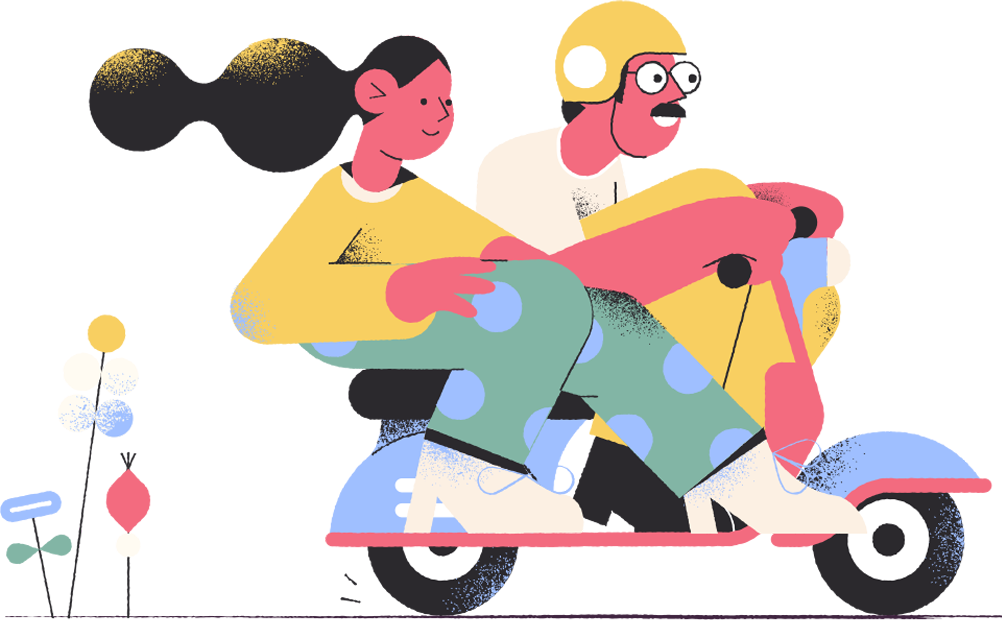 Two people grooming a dog